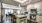 a kitchen with white cabinets