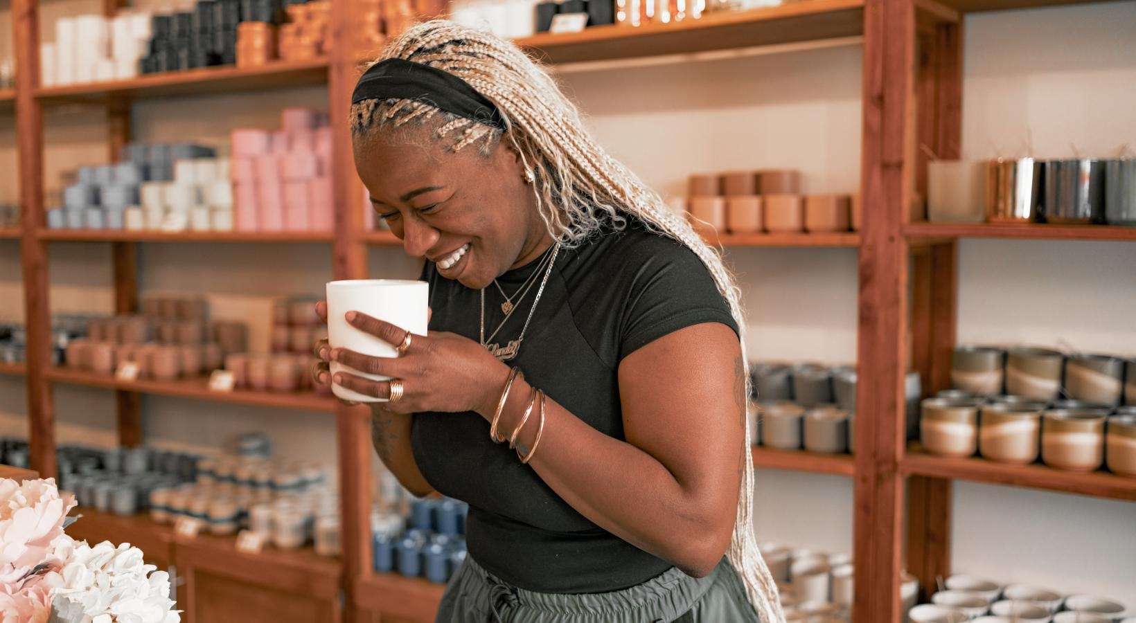 The essence of exceptional living a woman holding a cup