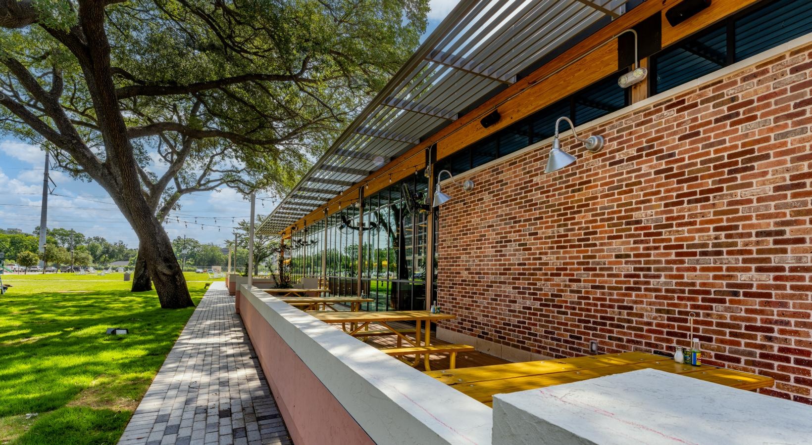The essence of exceptional living a brick building with a brick walkway