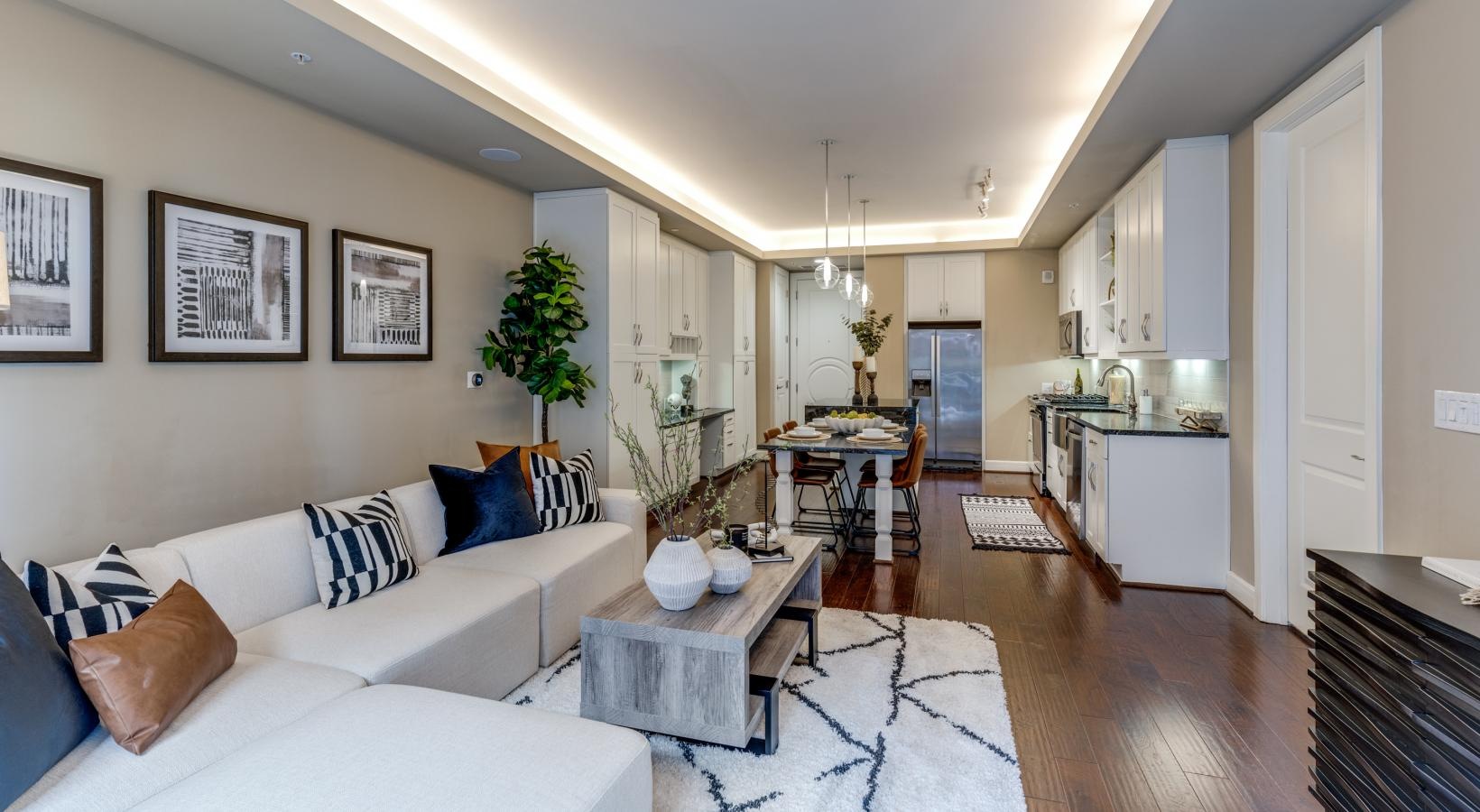 Generous living spaces to relax and unwind a living room with a couch and a table