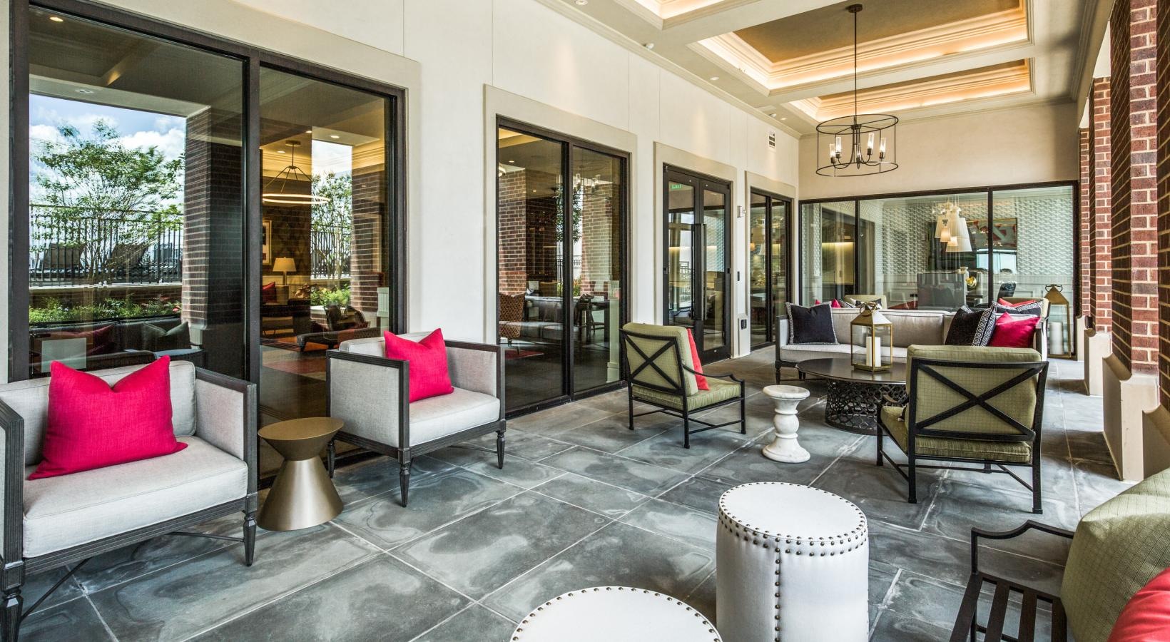 Enjoy our resident-only features a living room with a large glass door