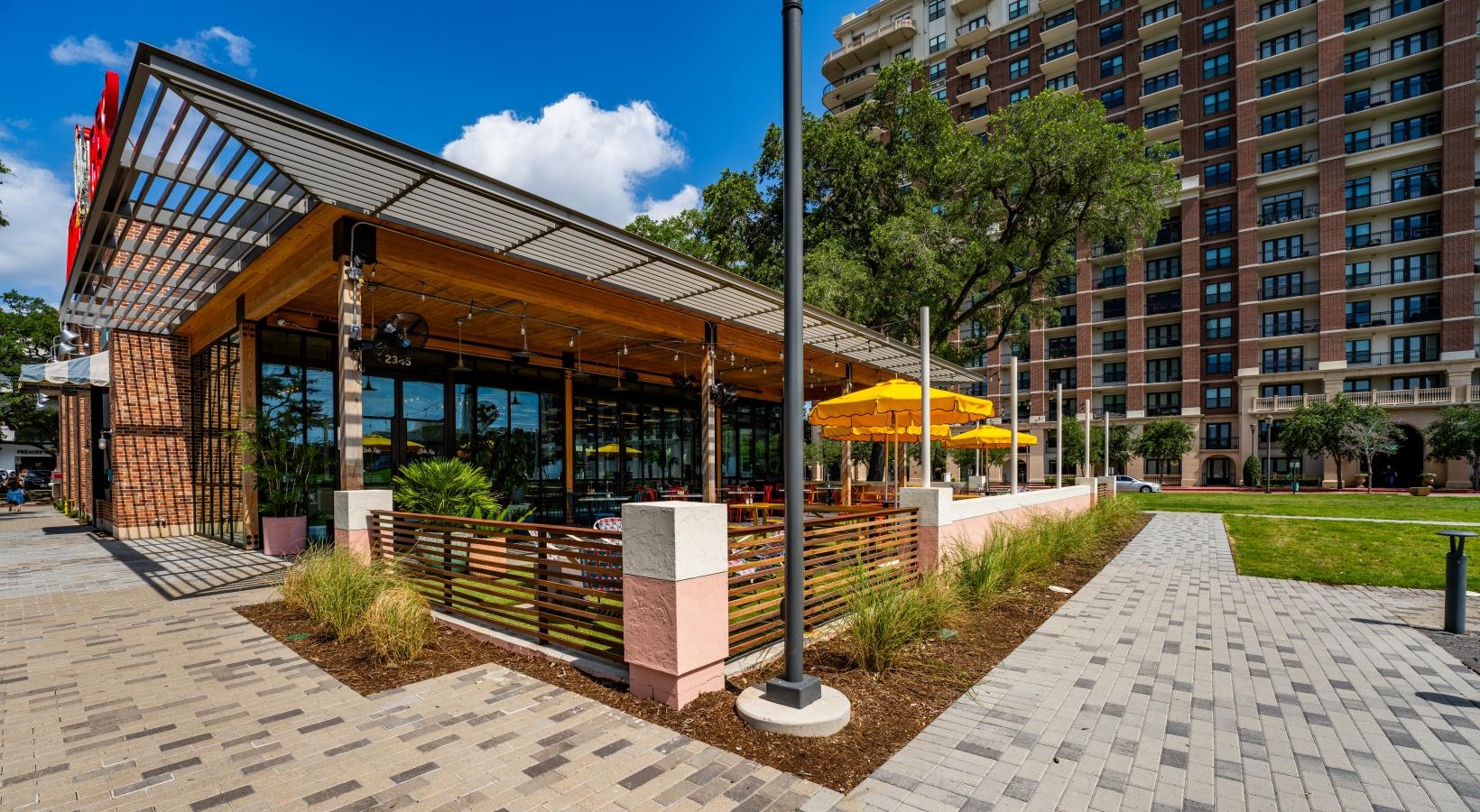 Find your perfect fit at The Ivy a building with a brick walkway