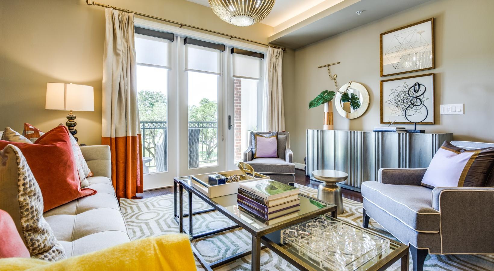 Beautiful living spaces with natural lighting a living room with a large window