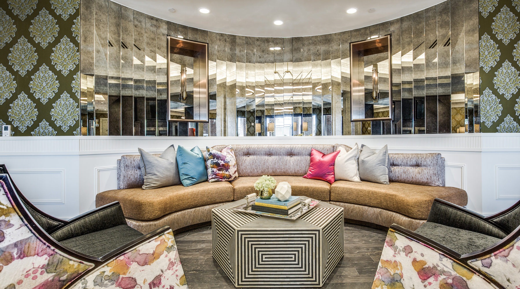 The essence of exceptional living a spacious clubroom with a large mirror