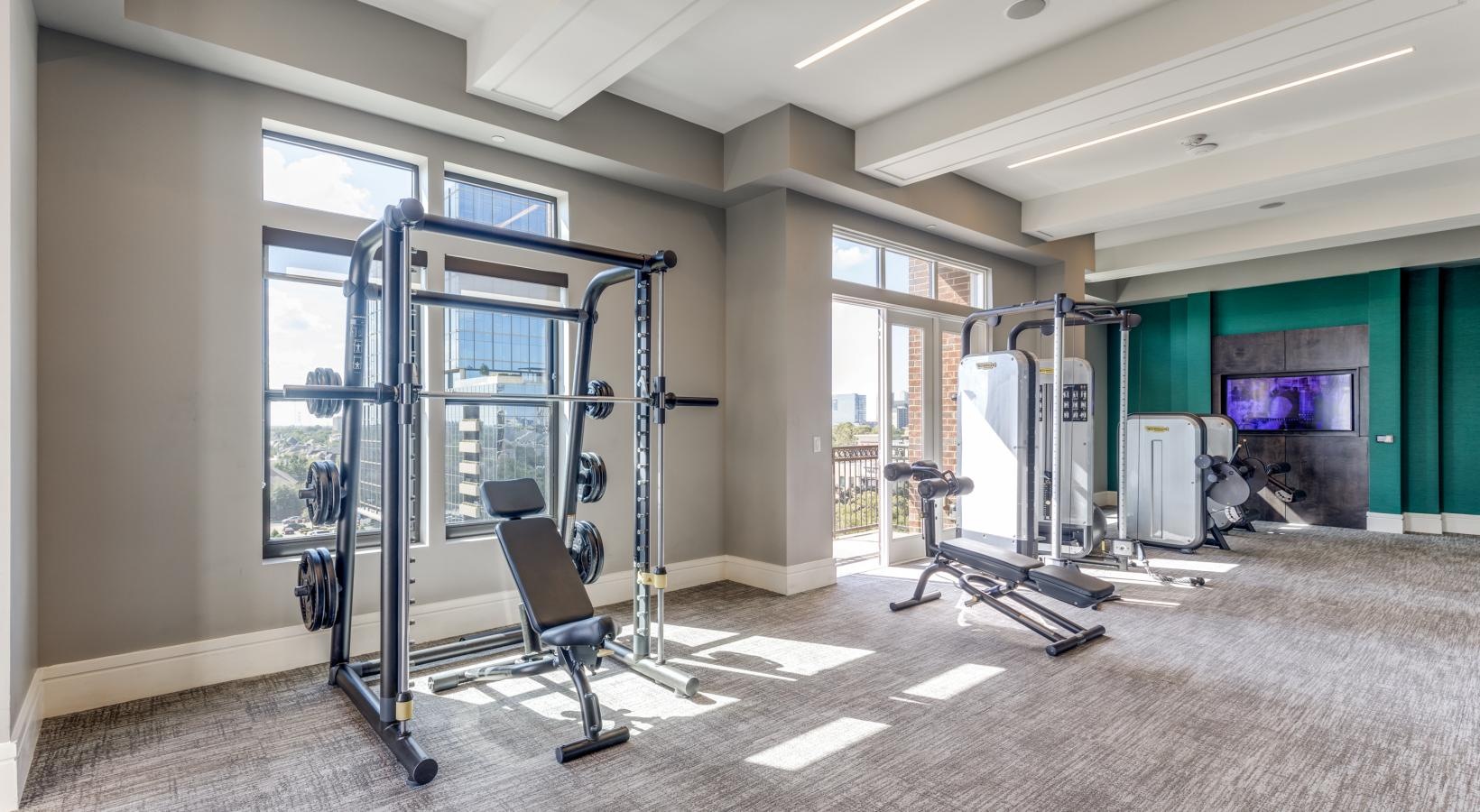 Access to resident-only features a fitness room with large windows