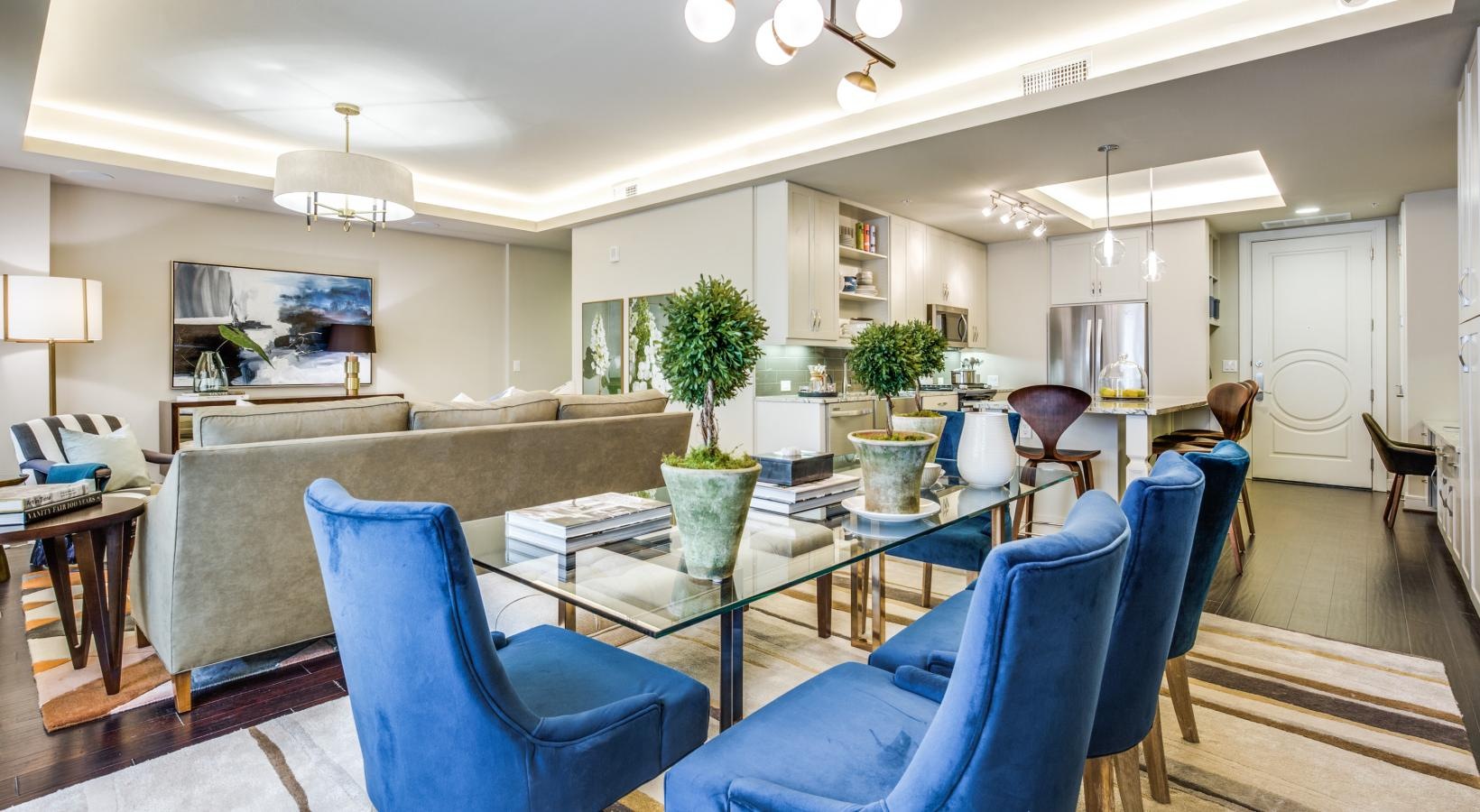 Relax and unwind in stylish living spaces a living room with blue chairs