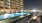 a pool on a building rooftop near a firepit