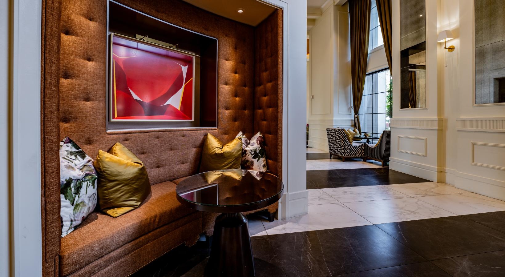 Everything within reach a spacious room with a sitting nook