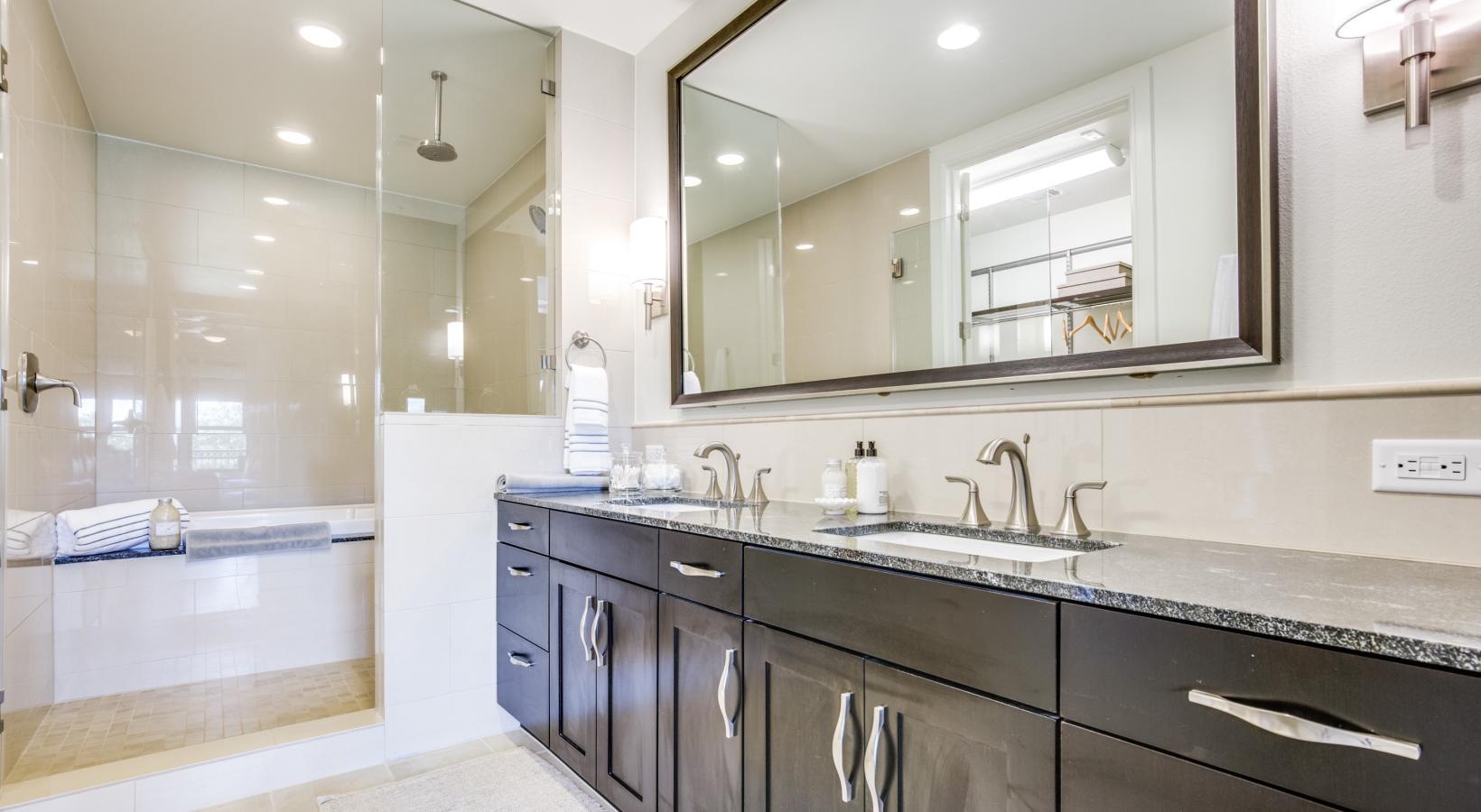 Spacious bathrooms with everything you need a bathroom with a large mirror