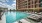 a swimming pool outside of a building