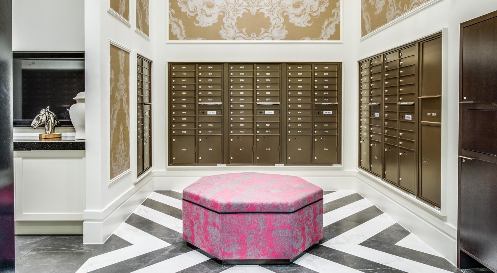 Enjoy our resident-only features a mail room with a couch and a table